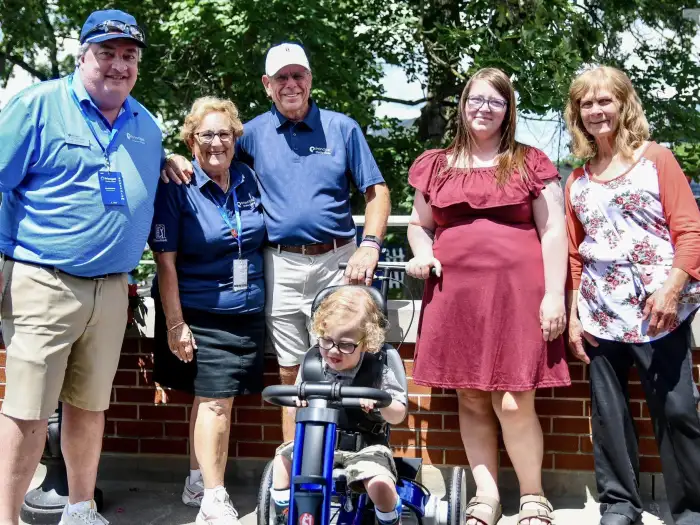 Kholson with Carl and Sally Harris