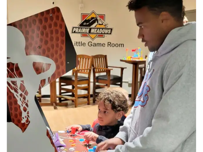 Big and Little playing in the arcade